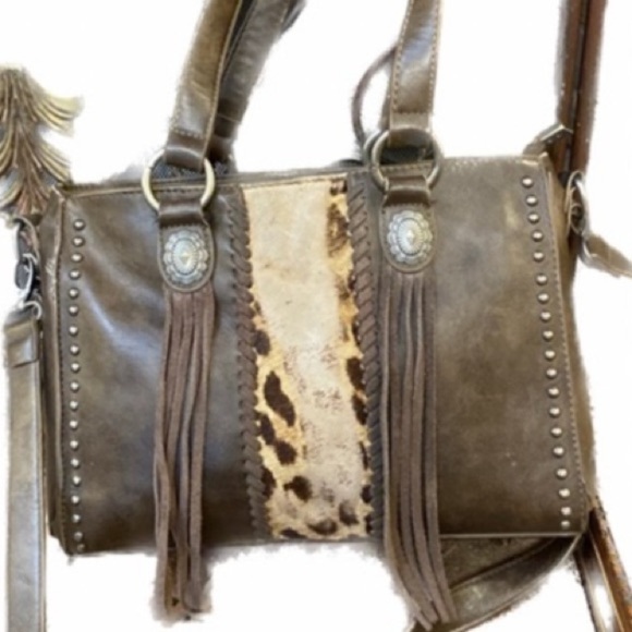 And I’m gonna have western style for concealed gun purse - Picture 2 of 6